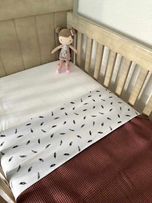 Ledikantlaken met veertjes